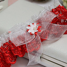 Свадебная подвязка для невесты "Беатрис" красно-белый